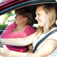 teenager driving a car