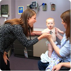 mom and baby visiting heart doctor