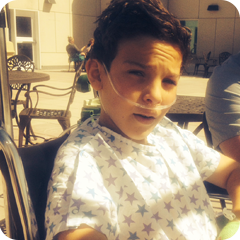 Alexander catches some sunshine on the patio
