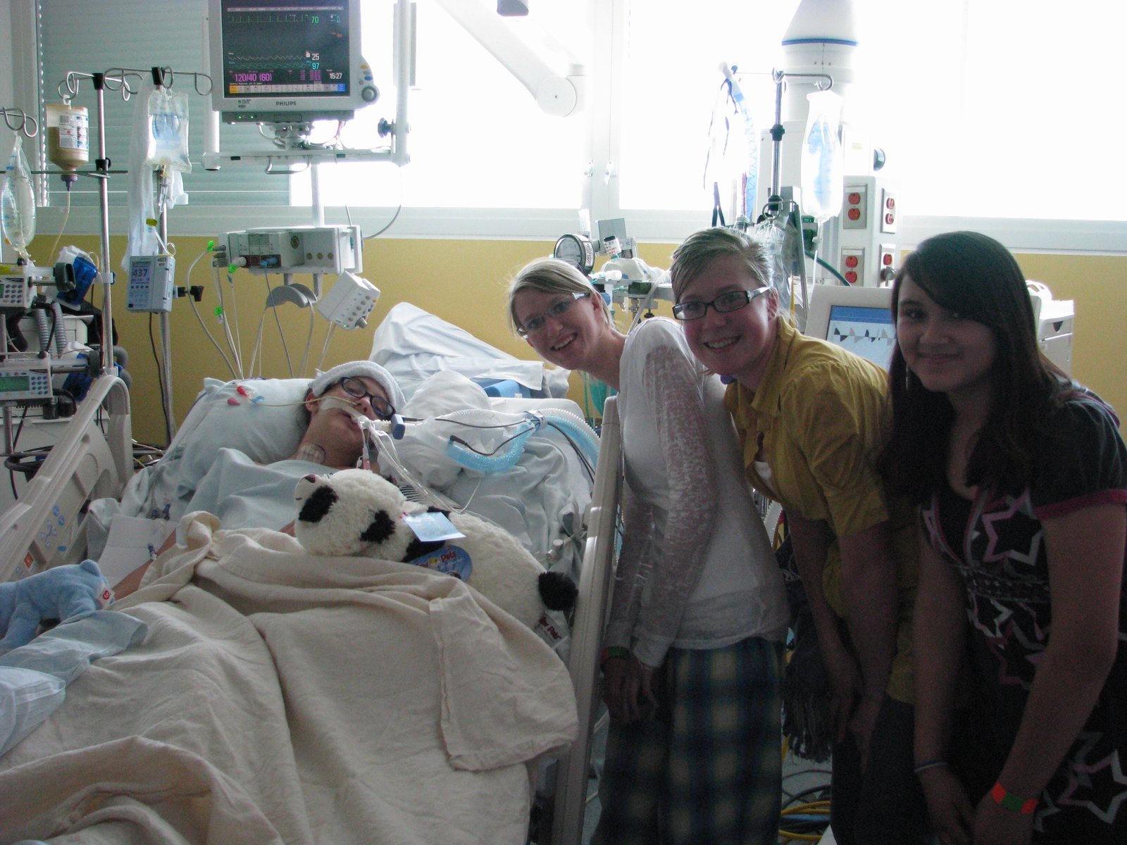 kendra in the hospital with family