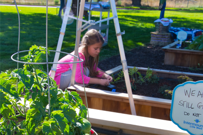 young girl in the garden
